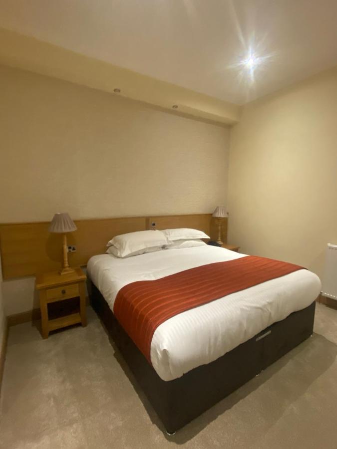 The City Hotel دنفرملاين المظهر الخارجي الصورة