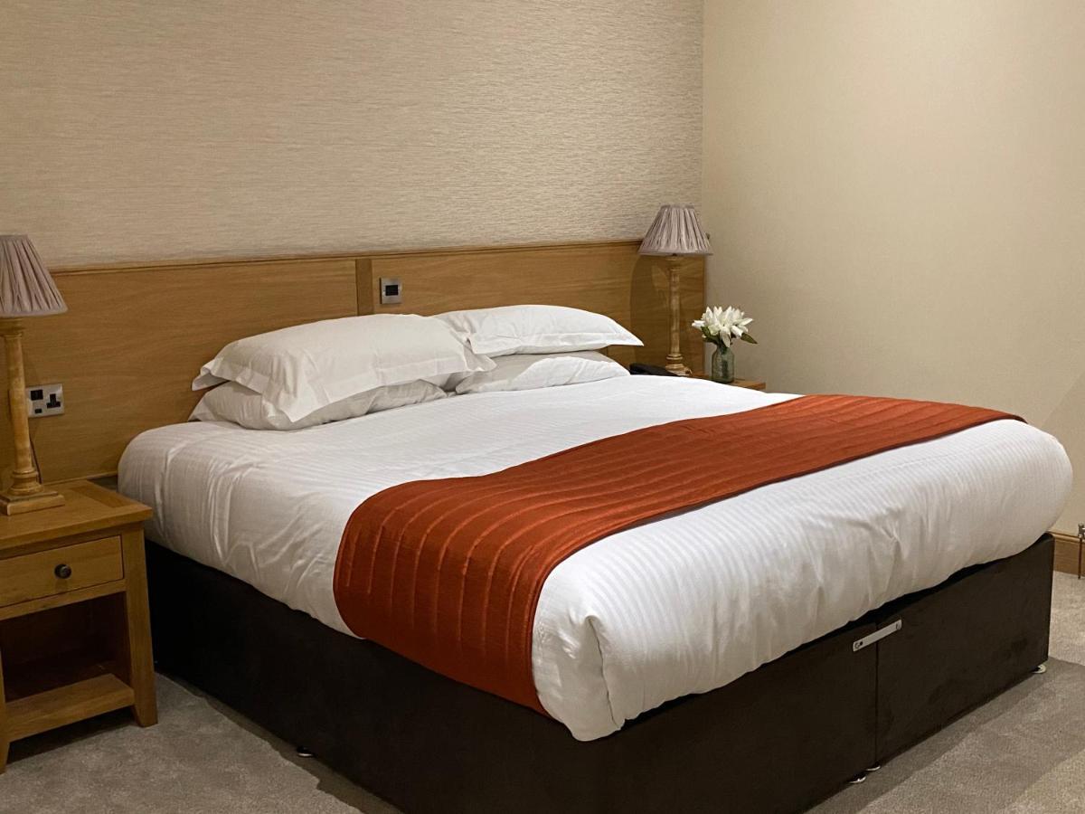 The City Hotel دنفرملاين المظهر الخارجي الصورة